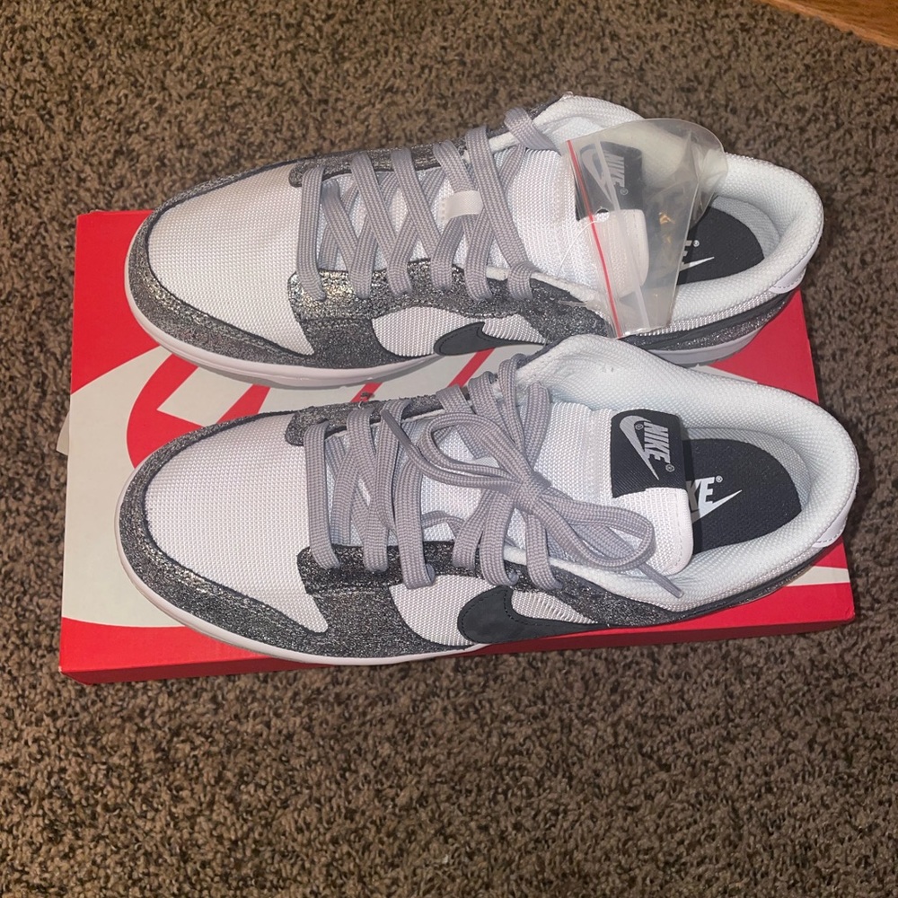 White and silver women’s low top dunk